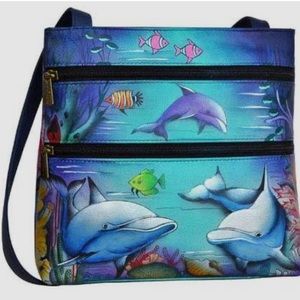 Anuschka Hand Painted Compact Crossbody Travel Organizer-Playful Dolphin